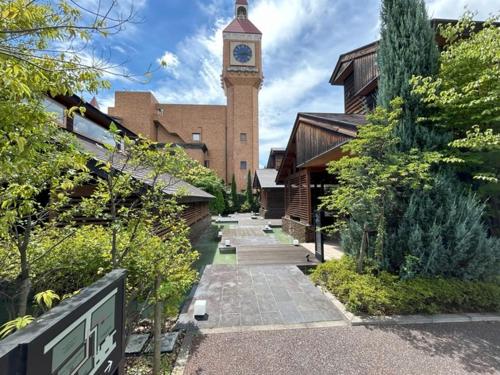 a building with a clock tower on top of it at Maebashi - House - Vacation STAY 64426v in Maebashi