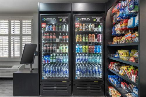 a large refrigerator filled with lots of drinks at SureStay Hotel by Best Western Beverly Hills West LA in Los Angeles