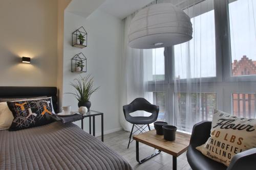 Posedenie v ubytovaní Apartament Zbożowy Rynek 2