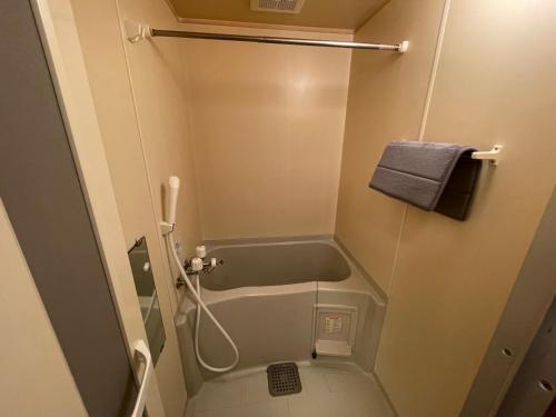 Ένα μπάνιο στο クラージュ本郷通