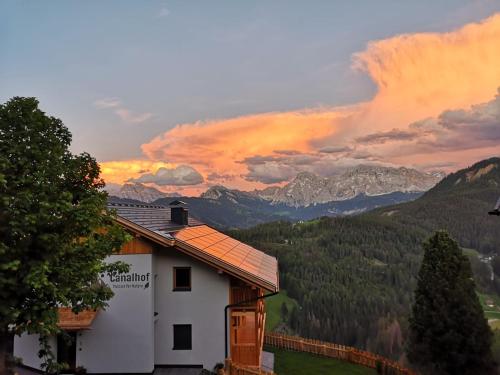 a house with a view of the mountains at Canalhof in Antermoia