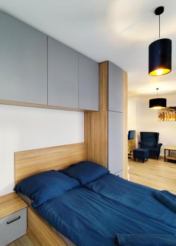 Ένα ή περισσότερα κρεβάτια σε δωμάτιο στο Apartament Paryski CENTRUM #nestapartamenty