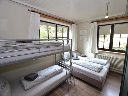 Una cama o camas en una habitación de Chalet in Leogang near Ski Slopes