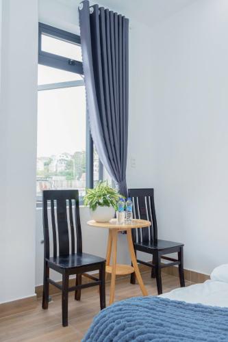 Ένα ή περισσότερα κρεβάτια σε δωμάτιο στο Yori House Da Lat City