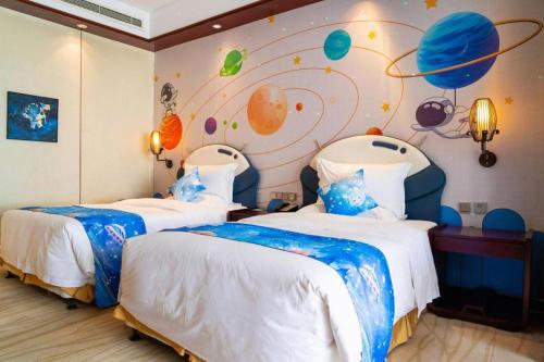 Cama o camas de una habitación en Langfang Ovation Hotel