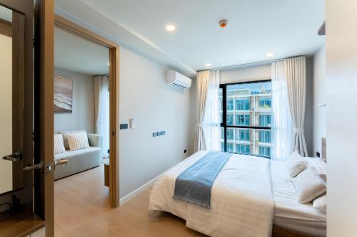 Ένα ή περισσότερα κρεβάτια σε δωμάτιο στο RJ Space