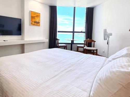 Katil atau katil-katil dalam bilik di Grand StarCity with Seaview