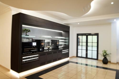 Kuchyň nebo kuchyňský kout v ubytování Hotel ESPERANTO Kongress- und Kulturzentrum Fulda