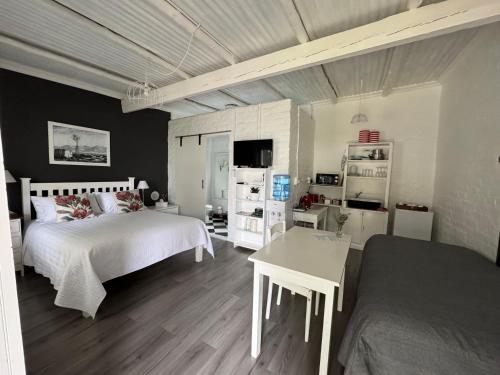 Postel nebo postele na pokoji v ubytování Rietjiesbos Self Catering