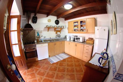 Kjøkken eller kjøkkenkrok på Casa da Rainha