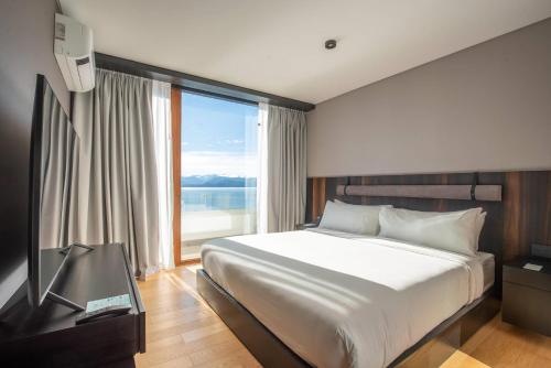 Postel nebo postele na pokoji v ubytování Radisson Blu Bariloche