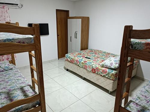 Cama o camas de una habitación en Casa Tamandaré Ramos