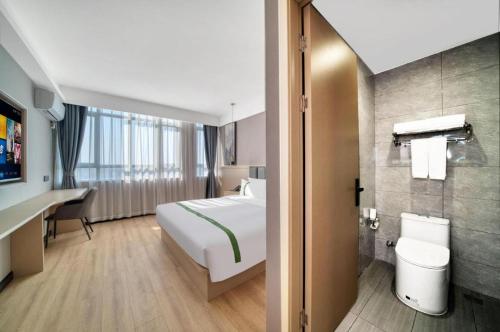 Phòng tắm tại GreenTree Inn Jiaxing ZhongHuan South Road Zhonggang City Express Hotel