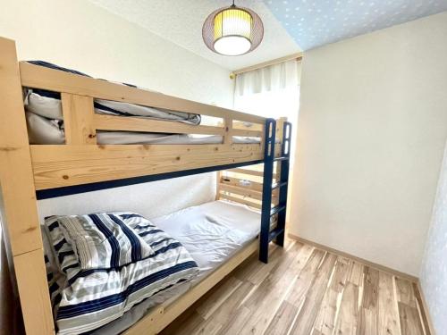 a bunk bed room with two bunk beds at Ueda Building - Vacation STAY 13581 in Asahikawa