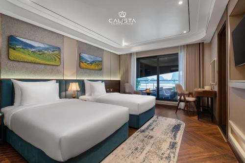 Ένα ή περισσότερα κρεβάτια σε δωμάτιο στο Calista Cruise - A Ha Long Bay Spectacle