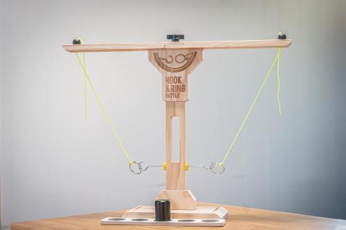 a wooden scale on top of a wooden table at HANABI棟-BASE棟 サウナ BBQ 農業体験 花火 が楽しめる ペット可 貸し切りで最大12名宿泊可能 Wi-Fi完備 in Katori