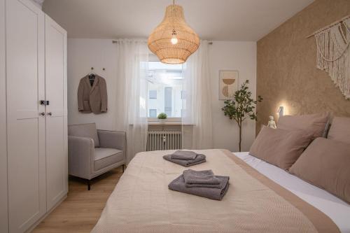 Ένα ή περισσότερα κρεβάτια σε δωμάτιο στο MY STAY - Erholung am Chiemsee in zentraler Lage in Prien