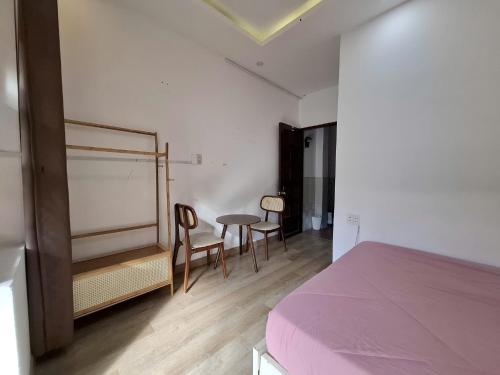 เตียงในห้องที่ Lunaria Maison - Tan Dinh Corner