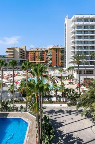 a view of a resort with a pool and a parking lot at Sol Torremolinos - Don Pablo in Torremolinos