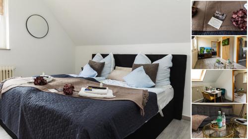 a bedroom with a large bed with blue and white pillows at AMA Home - Komfortables Apartment mit WLAN & Smart-TV - schnelle Anbindung A30 & A2, 10 Min nach Herford in Hiddenhausen