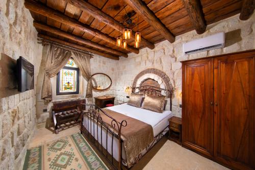 Katil atau katil-katil dalam bilik di Dionysos Cave Cappadocia Hotel