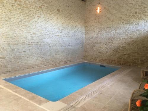 Πισίνα στο ή κοντά στο Maisonnette de charme avec option Piscine intérieure privée chauffée