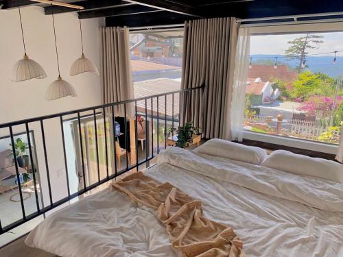 Postel nebo postele na pokoji v ubytování Cuc ku homestay