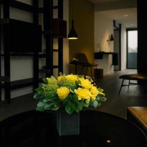 a bouquet of yellow flowers sitting on a table at OFF in Wavre