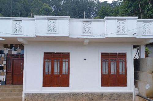 Balkón nebo terasa v ubytování Foxhill Resort Diyathalawa