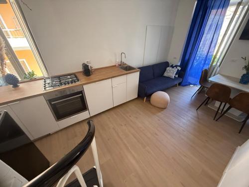 an aerial view of a kitchen and living room at Cairoli House- Grottammare in Grottammare