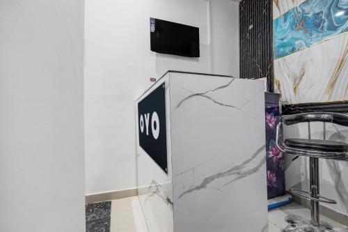 TV a/nebo společenská místnost v ubytování Hotel O Grand Hotel