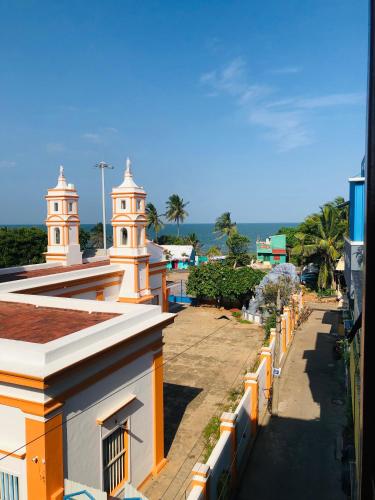 a view of two towers on top of a building at Virtus Villa in Puducherry