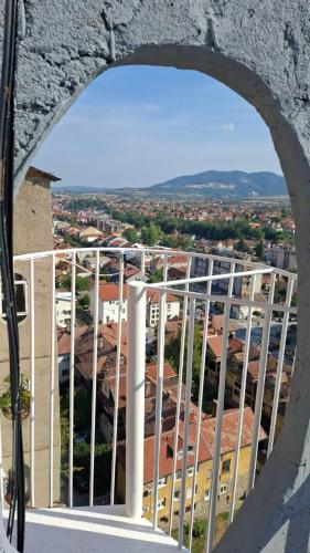 a view of a city from a window at Apartman Horizont in Arandjelovac