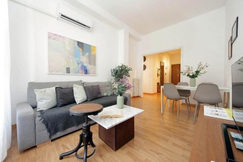 a living room with a couch and a table at Giuliana Vatican Family Home in Rome