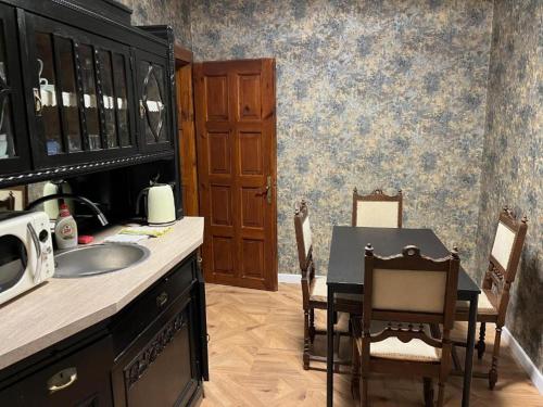 Kuchyň nebo kuchyňský kout v ubytování Apartments Zámoček Staré časy
