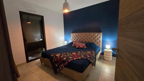 Ένα ή περισσότερα κρεβάτια σε δωμάτιο στο Nepita-Dolce-Vita T2 sea view