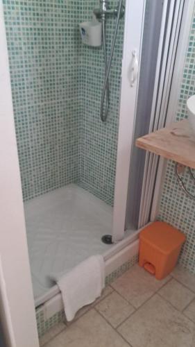 a bathroom with a shower with a sink at B&B Cheap Holidays in Sorso