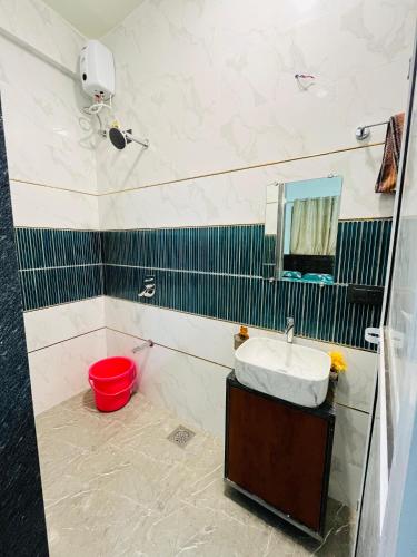 Un baño de Shree Samarth Krupa Guesthouse