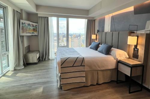 Ένα ή περισσότερα κρεβάτια σε δωμάτιο στο Riu Plaza Toronto