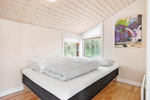 Un pat sau paturi într-o cameră la LN1901-Hjorring-Sneppevej-15