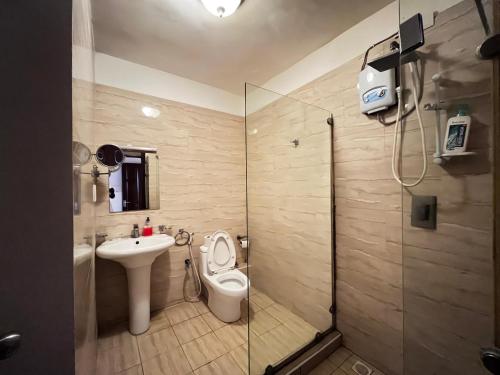 Koupelna v ubytování Jujo Beachfront Apartment's