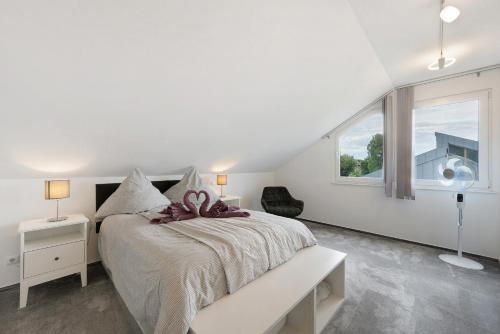 Postel nebo postele na pokoji v ubytování Ferienwohnung Nordschwarzwald