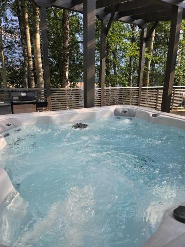a jacuzziificialificialificialificialificialificialificialificialificialificialificial at The Haven of Riverside - Villa Sieripirtti in Rovaniemi