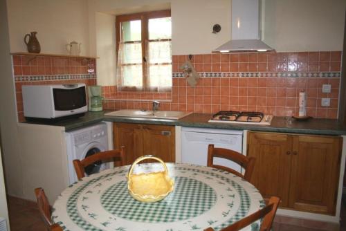 Kuchyň nebo kuchyňský kout v ubytování Domaine du coude