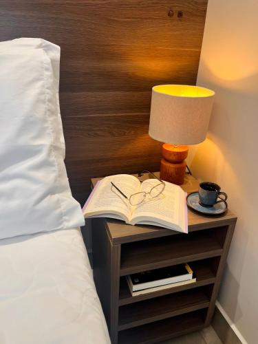 Ένα ή περισσότερα κρεβάτια σε δωμάτιο στο Concept Hotel Flat