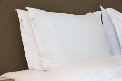 Ένα ή περισσότερα κρεβάτια σε δωμάτιο στο Holiday Inn Express Chengdu Wenjiang Hotspring by IHG