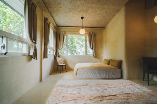 Katil atau katil-katil dalam bilik di Six Lands homestay