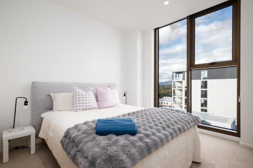Katil atau katil-katil dalam bilik di Modern fully equipped apartment 2B2B