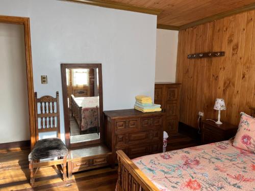 Letto o letti in una camera di Hostal Casa Rosada, Valle del Elqui