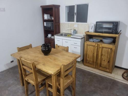 Una cocina o zona de cocina en Si Mi Capitán - Cabañas & Habitaciones